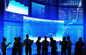 Some traders stand in front of screens on the stock market. But what is the stock market?