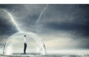 A man in a protective bubble protected from a storm representing the safety of recession proof stocks.